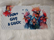 Load image into Gallery viewer, I don't give a cluck license plate