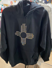 Load image into Gallery viewer, Black hoodie with yellow and clear rhinestone NM Zia symbol