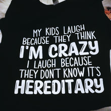 Load image into Gallery viewer, My Kids Laugh Because They Think I'm Crazy I Laugh Because They Don't Know It's Hereditary Black Tee