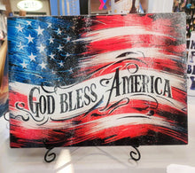 Load image into Gallery viewer, Watercolor God Bless America U.S. Flag on a Sublimated Glass Cutting Board
